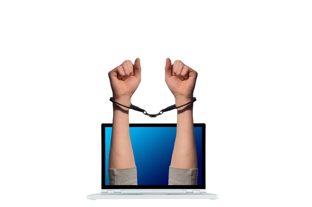 crime, handcuffs, laptop-4512605.jpg